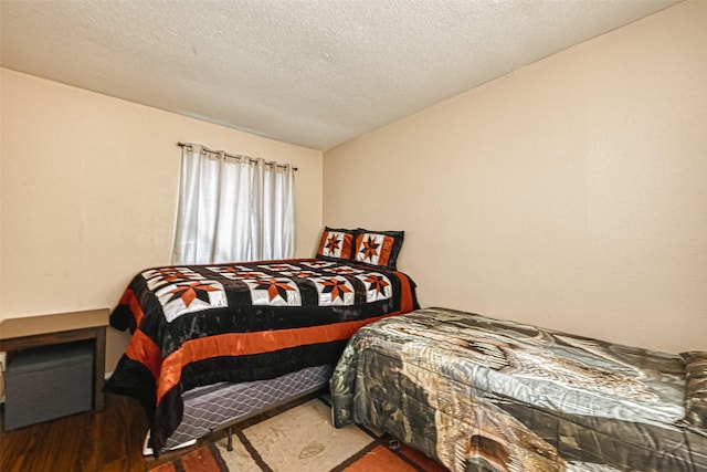 bedroom featuring a textured ceiling