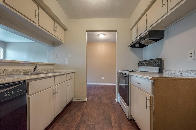 kitchen featuring dark wood-type flooring, sink, range with electric stovetop, black dishwasher, and cream cabinetry