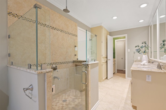 bathroom with ornamental molding, tile patterned flooring, a shower with door, and vanity