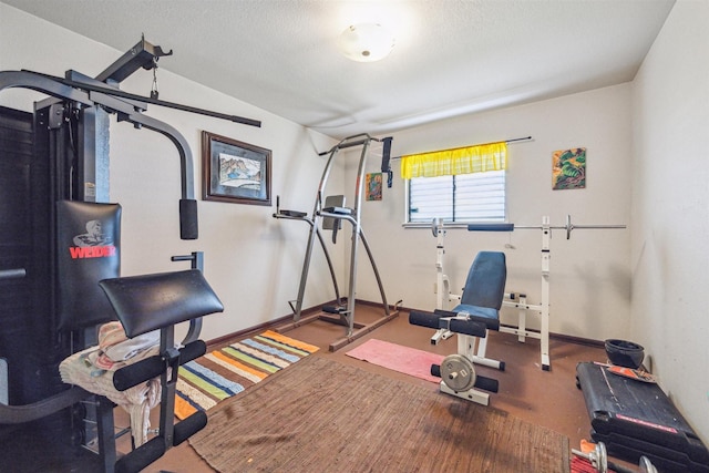 exercise area with a textured ceiling