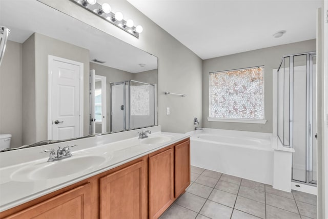 bathroom with vanity, tile patterned floors, and separate shower and tub