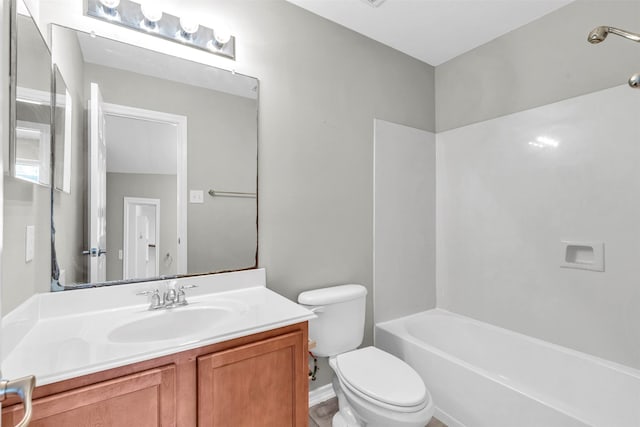 full bathroom with vanity, shower / bathing tub combination, and toilet