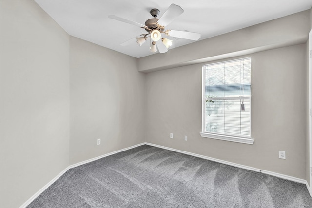 carpeted empty room with ceiling fan