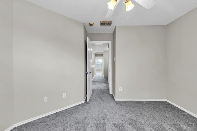 unfurnished room with ceiling fan and carpet floors