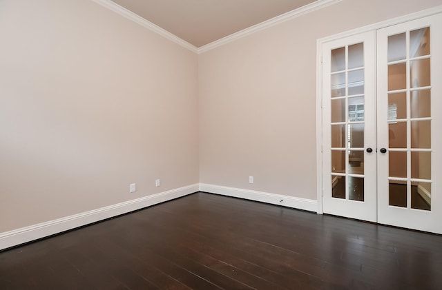 unfurnished room featuring ornamental molding, dark hardwood / wood-style floors, and french doors