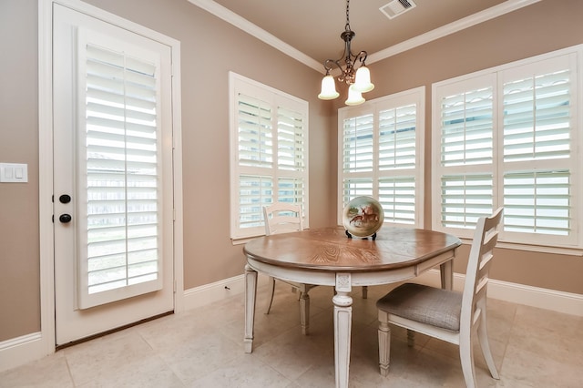 tiled dining space with crown molding, plenty of natural light, and an inviting chandelier