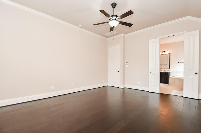 unfurnished bedroom with ornamental molding, dark hardwood / wood-style floors, ensuite bathroom, and ceiling fan