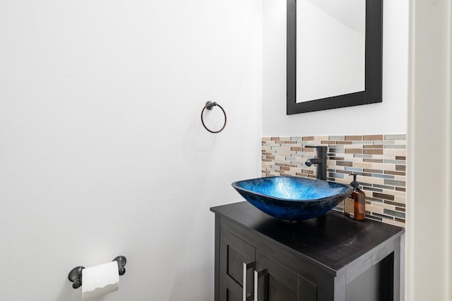 bathroom with vanity and backsplash