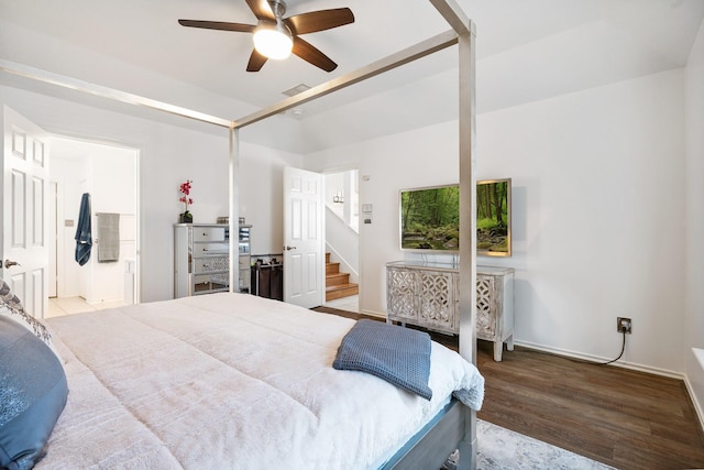 bedroom featuring hardwood / wood-style floors, ceiling fan, and ensuite bathroom