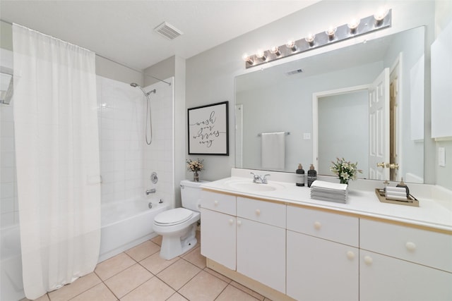 full bathroom featuring vanity, shower / tub combo, tile patterned floors, and toilet