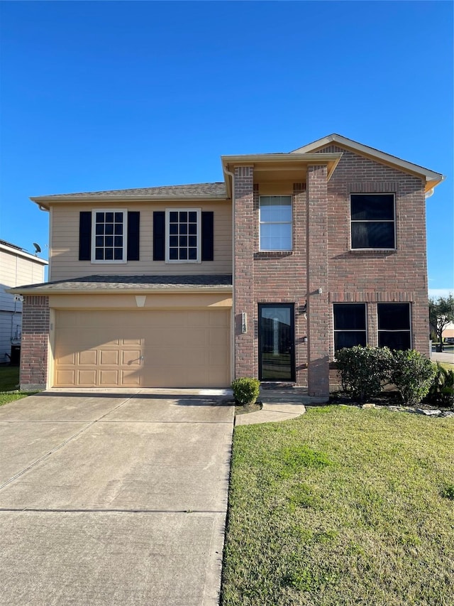 view of front of home with a garage and a front lawn