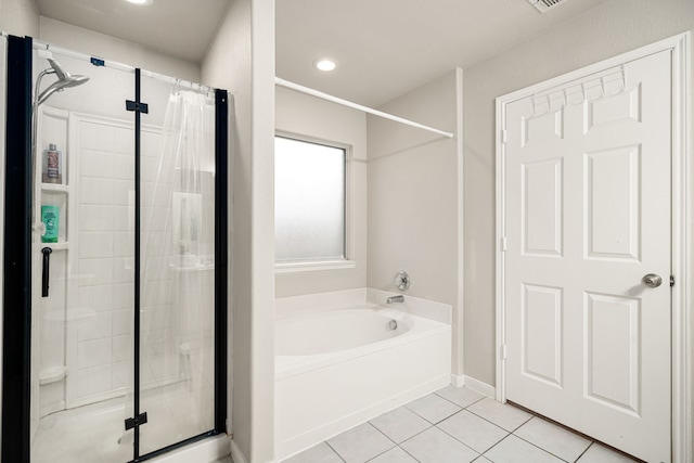 bathroom with tile patterned flooring and plus walk in shower