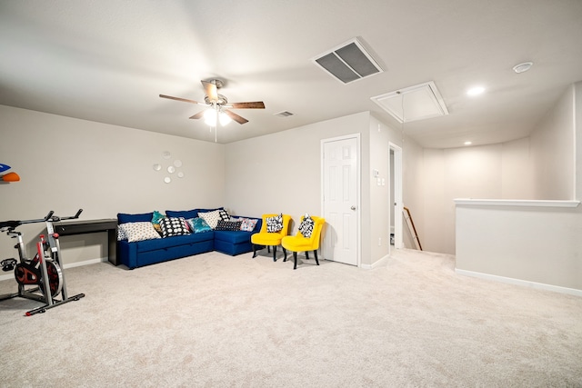 rec room with ceiling fan and light colored carpet