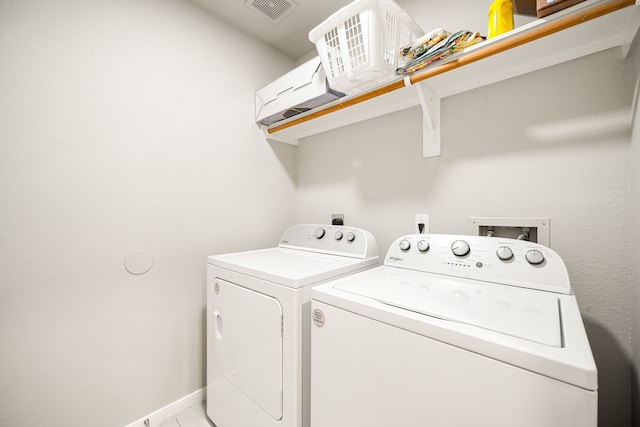 washroom featuring separate washer and dryer