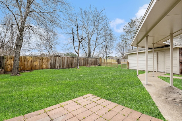 view of yard featuring a patio and a fenced backyard