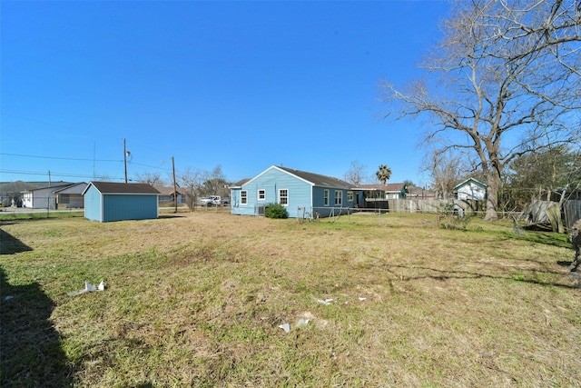 view of yard featuring a storage unit