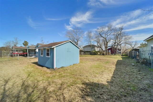 view of yard featuring a storage unit