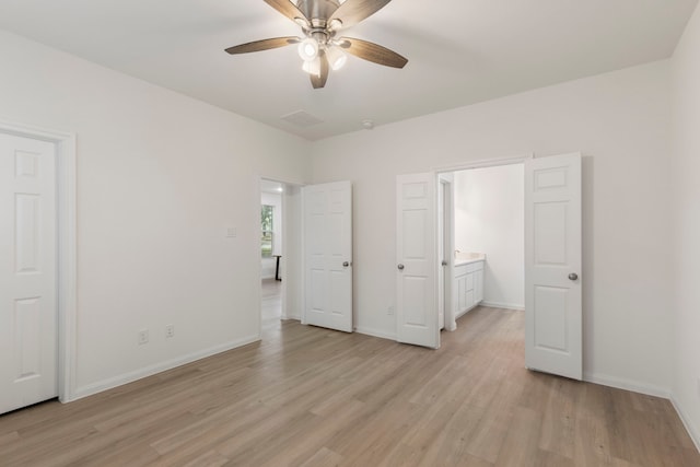 unfurnished bedroom featuring ceiling fan and light wood-type flooring