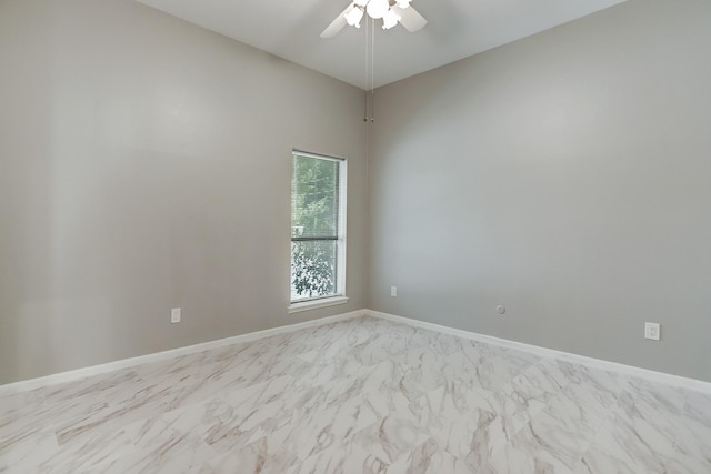 unfurnished room with ceiling fan