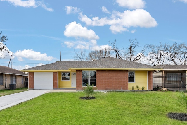 ranch-style home with a garage and a front lawn