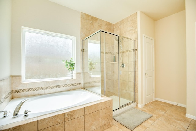 bathroom featuring independent shower and bath and tile patterned floors