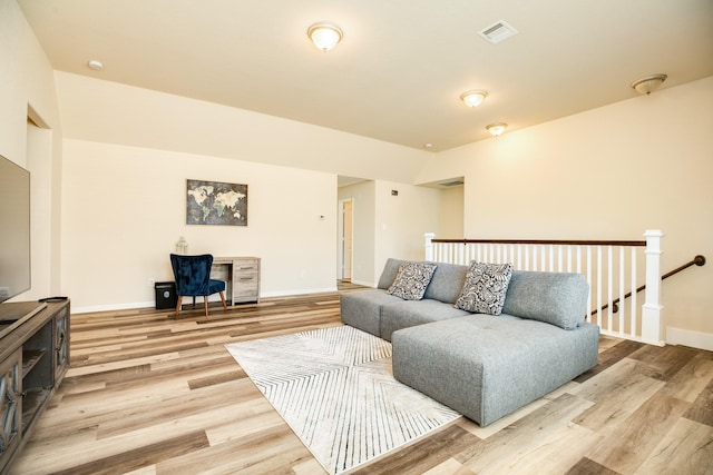 living room featuring light wood-type flooring