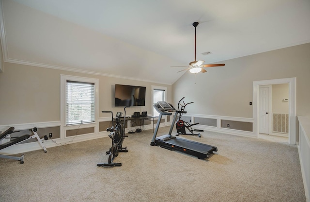 exercise room with lofted ceiling, crown molding, and carpet flooring