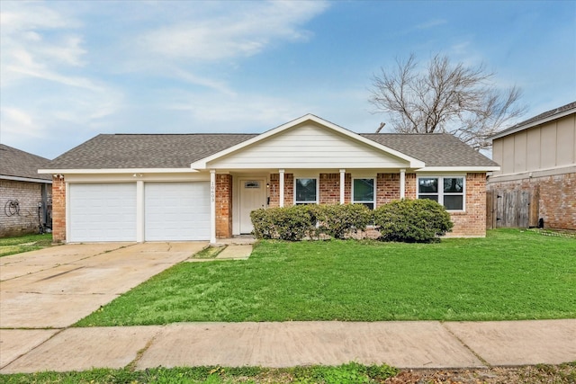 ranch-style home featuring a garage and a front lawn