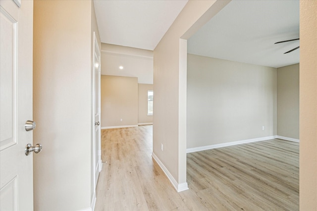 hallway featuring light hardwood / wood-style flooring