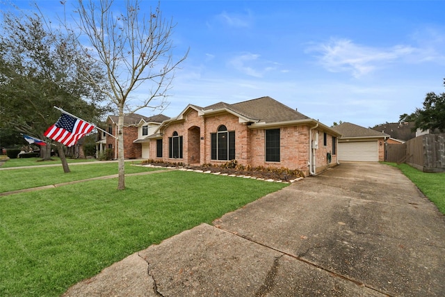 view of front of home featuring brick siding, a shingled roof, a front yard, and fence