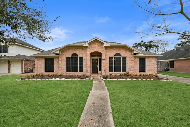 single story home with brick siding, a garage, a front lawn, and roof with shingles