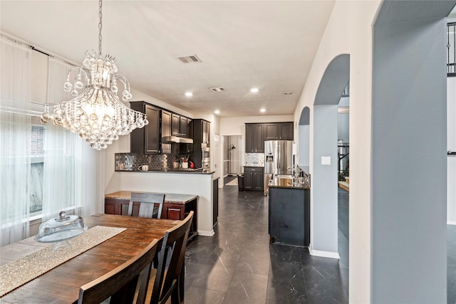 dining room with an inviting chandelier