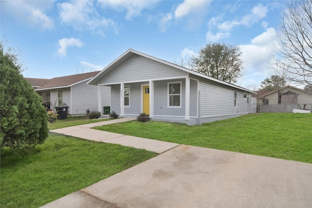 view of front of property with a porch and a front yard