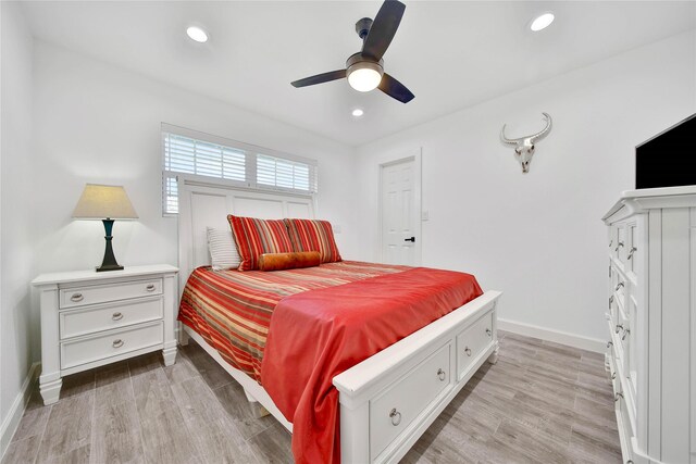 5307 Alba Rd, Houston, TX 77091 - bedroom featuring baseboards, light wood-type flooring, recessed lighting, and a ceiling fan
