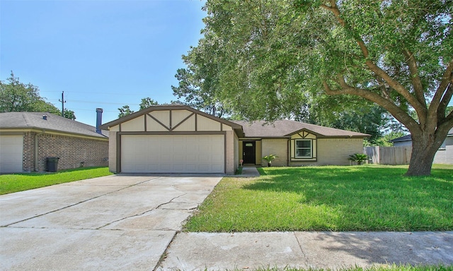 view of front facade with a garage and a front lawn