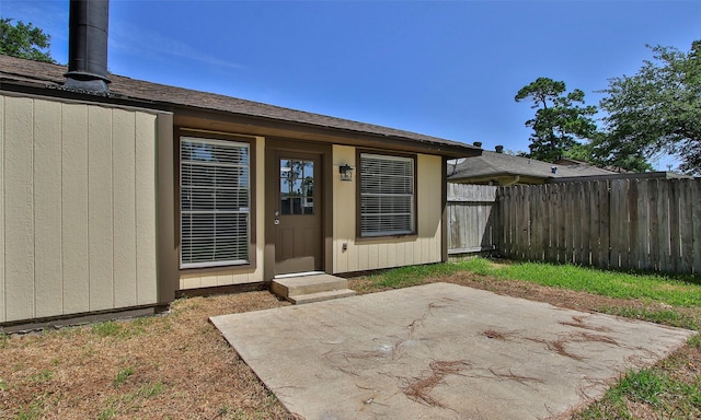 property entrance with a patio area