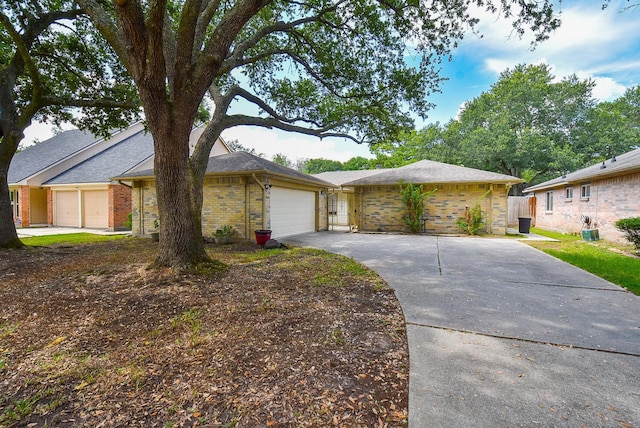 ranch-style home with a garage