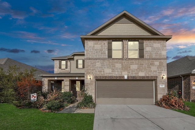 view of front of property featuring a garage