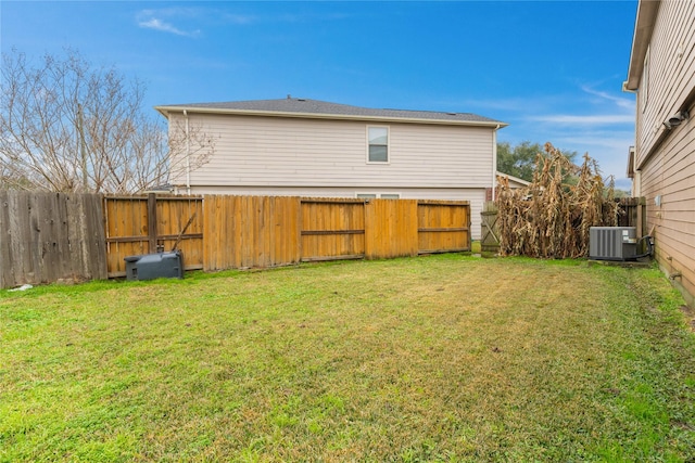 view of yard with central AC