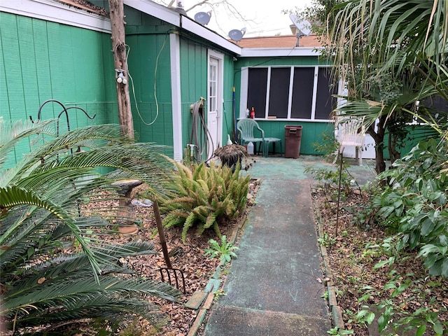 view of property exterior featuring a patio area