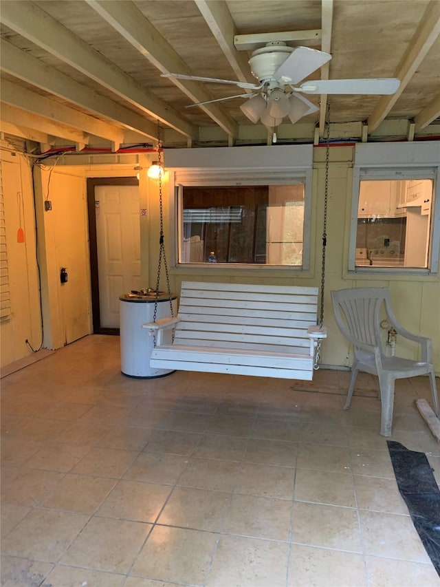 interior space featuring ceiling fan