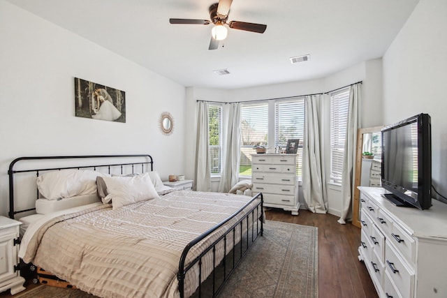 bedroom featuring dark wood-type flooring and ceiling fan