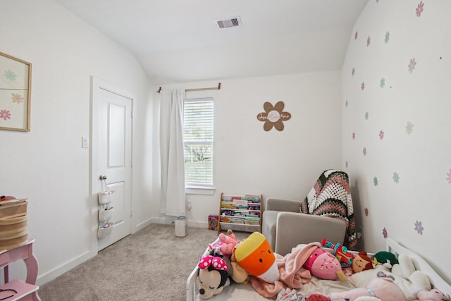 bedroom with light carpet and lofted ceiling