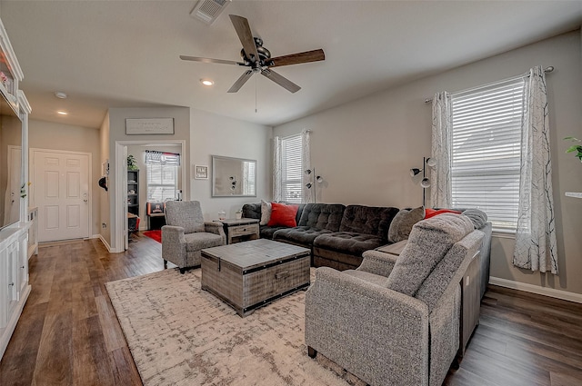 living room with ceiling fan and hardwood / wood-style floors