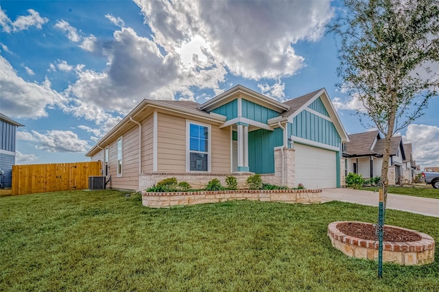 craftsman house featuring a garage, central AC, and a front lawn