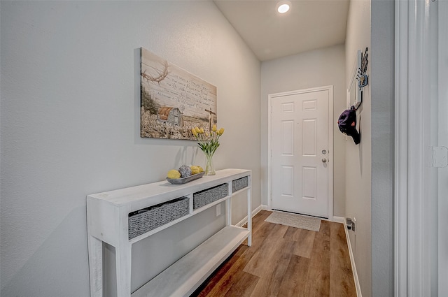 entryway with light hardwood / wood-style flooring