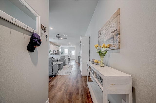 hallway featuring dark hardwood / wood-style flooring