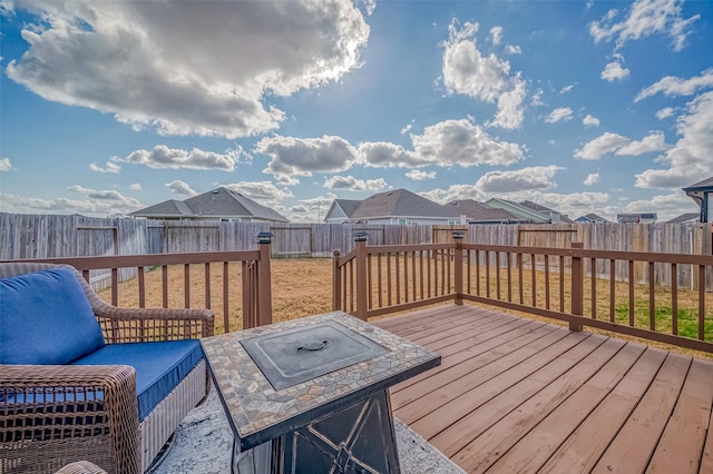 deck with an outdoor fire pit