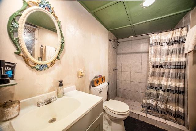 bathroom featuring vanity, curtained shower, and toilet