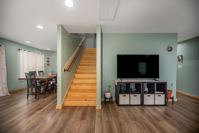 living room featuring dark hardwood / wood-style floors